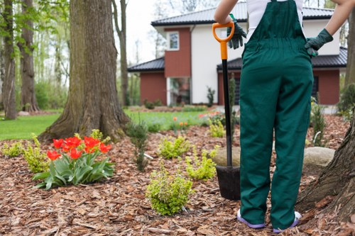 Wood chipping and on-site compost bay for sustainable gardening